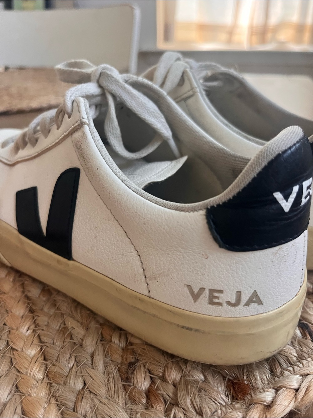 VEJA women’s White Leather Low-Top Sneakers with Black Detail; Size 7